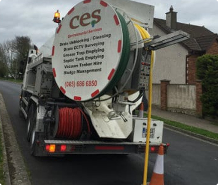 Gully cleaning truck carrying out gully emptying and cleaning