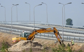 CES Environmental Services for the Construction Industry - image of digger and road under development